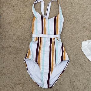 Striped one-piece swimsuit with pockets